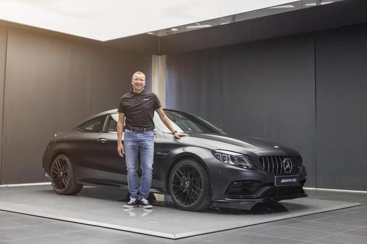 https://th.thgim.com/business/Industry/itq4tr/article31685456.ece/alternates/FREE_730/Mr-Martin-Schwenk-MD-and-CEO-Mercedes-Benz-India-with-the-new-AMG-C-63-Cou