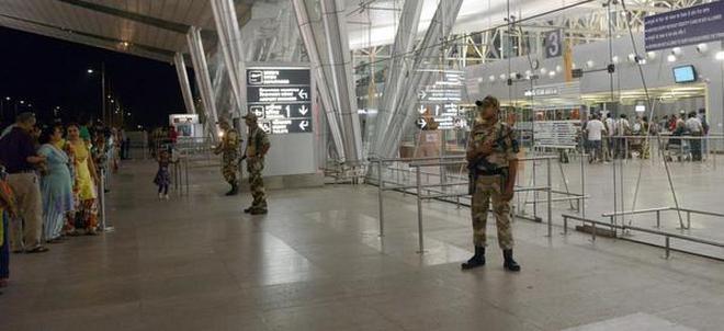 Central Industrial Security Force personnel stand guard at the Sardar Vallabhbhai Patel International airport in Ahmedabad. File