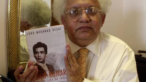 Lord Meghnad Desai, Professor of Economics and Director of the Centre for the Study of Global Governance at the London School of Economics, with the book authored by him on actor Dilip Kumar.