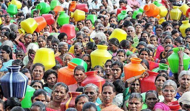 Image result for DMK party members protests in Chennai for water scarcity with Pots