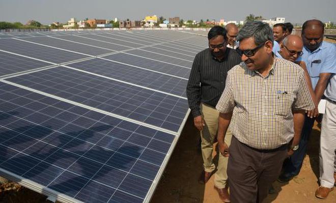 Eco-friendly: Anuj Aggarwal , Member (HR), Airports Authority of India, inspecting the solar plant in Tiruchi International Airport on Friday. Airport Director K. Gunasekaran is seen.