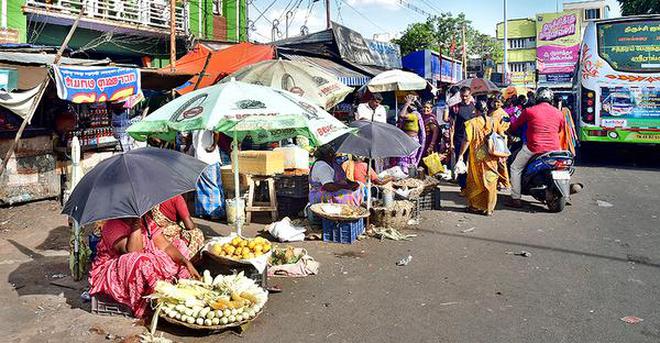 Roadside vendors in Gandhi Market cause traffic congestion, but vendors rue that they have nowhere to go.
