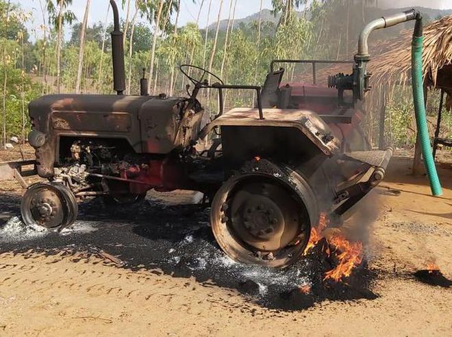 A tractor set on fire by Maoists at Sarivela village.