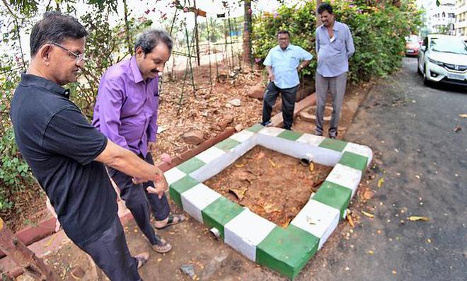 Every drop counts: JR Nagar Residentsâ Welfare Association president K.S.R. Murthy at a rainwater harvesting structure in the colony, in Visakhapatnam.