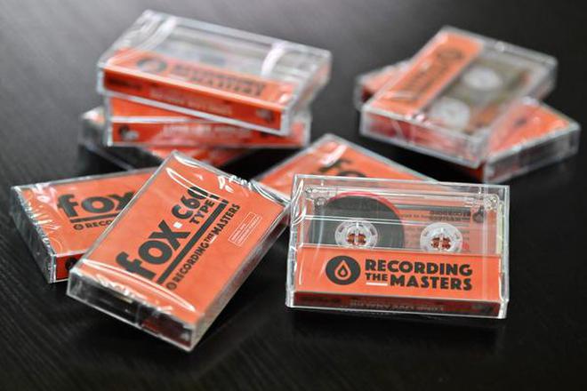 This picture taken on March 14, 2019, shows audio cassettes made with magnetic stripes in the production plant of Mulann, in Avranches, northwestern France. - Mulann products magnetic stripes for magnetic cards like bank card and for audio use like vintage audio cassette. (Photo by CHARLY TRIBALLEAU / AFP)
