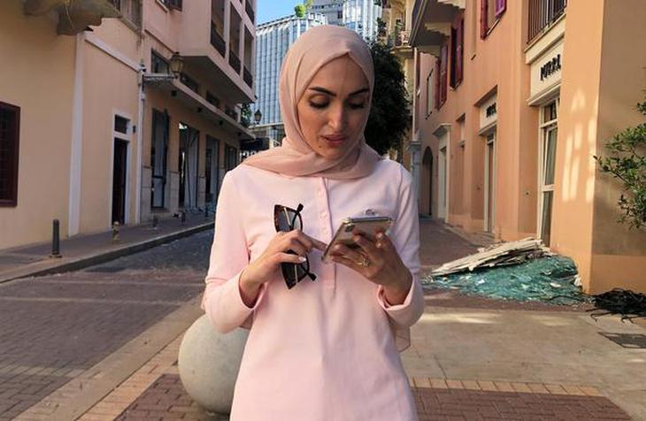 Bride Israa Seblani poses for a picture in the same place where she was taking her wedding photos yesterday at the moment of the explosion that occurred at Beirut's port area, in Beirut, Lebanon August 5, 2020.