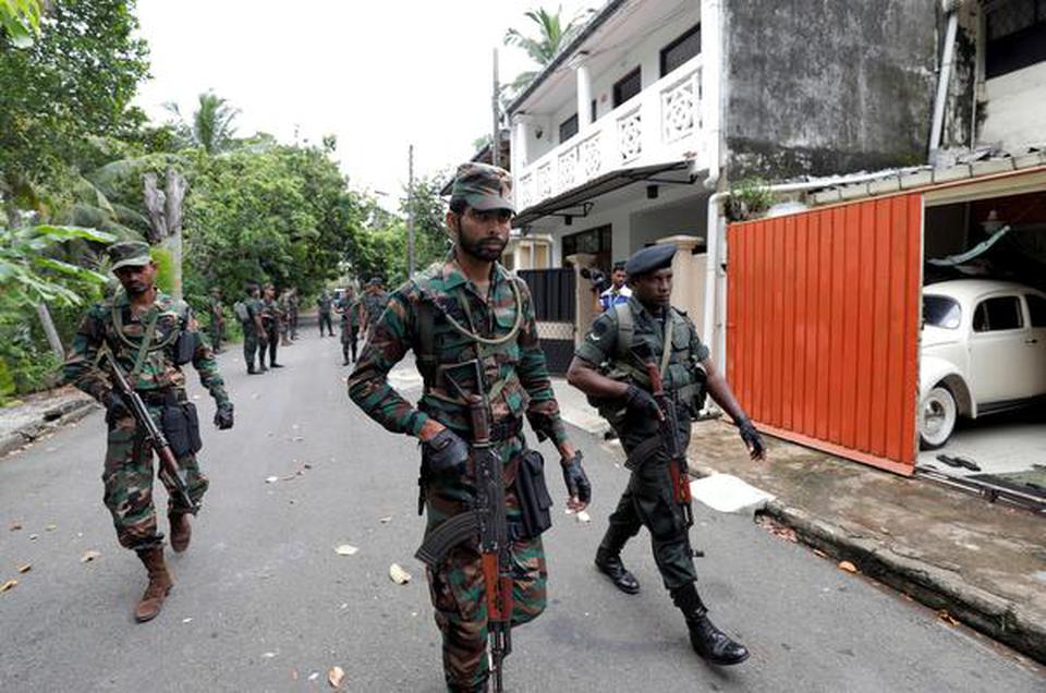 Sri Lankan army soldiers during a search operation in Mattegoda, Sri Lanka, on Saturday, May 25, 2019.