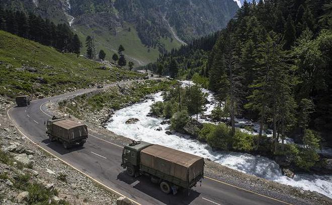 Carrying reinforcements: An Army convoy on the way to Leh through a highway bordering China on Friday.