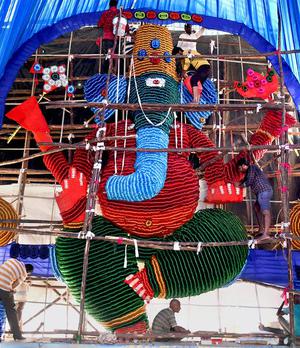 An idol made of two lakh bangles at Thummalagunta .