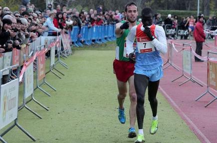 Sportsmanship is the winner: Spanish runner Ivan Fernandez Anaya guiding Kenyan racer Abel Mutai to victory in the December 2012 cross-country race at Burlada, Navarre, Spain.