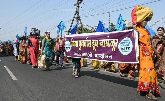 Marching on: Farmers, potters and fishermen displaced by the Sardar Sarovar Dam project taking out a rally, in Bhopal on Saturday.