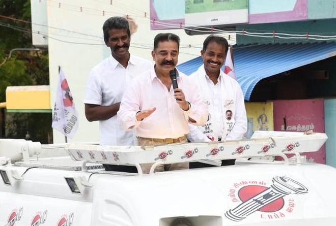 Makkal Needhi Maiyam (MNM) founder Kamal Haasan speaks at a rally for Tirupparankundram assembly by election at Thoppur in Madurai on May 15, 2019.