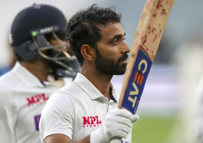 India's Ajinkya Rahane waves his bat to the crowd as he leaves the field following play on day two of the second cricket test between India and Australia at the Melbourne Cricket Ground, Melbourne, Australia, Sunday, Dec. 27, 2020. | Photo Credit: AP