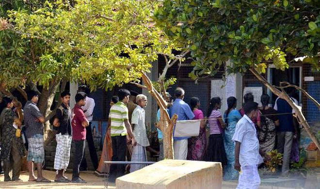 ”The Tamil voters’ message to national leaders and their own elected representatives has been unambiguous in every crucial election post-war.” Voters wait to cast their votes in Jaffna before the Northern Provincial Council election in 2013.