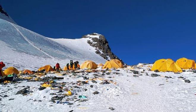 Peak break: A file photo shows discarded climbing equipment and rubbish scattered around Camp 4 of Mount Everest.