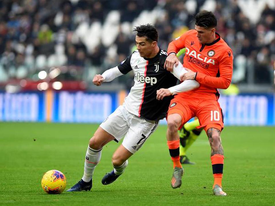 Juventus’ Cristiano Ronaldo in action during the Serie A football tournament against Udinese in Milan on December 15, 2019.
